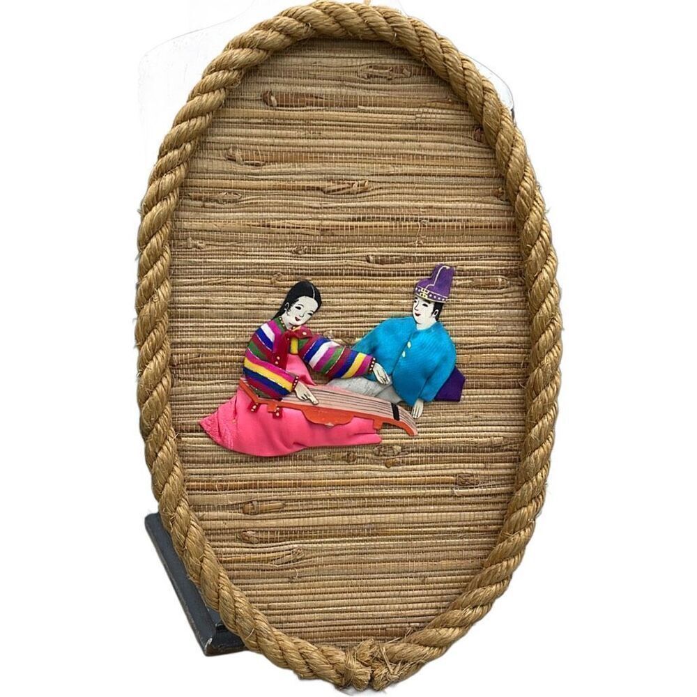 Oval shaped embroidered Seoul Korean wall hanging.